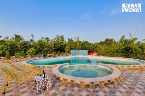 Hingana Villa | StayVista's Green Embrace - Villa in Bor Tiger Reserve with Swimming Pool, Rainshower, Terrace & Lawn