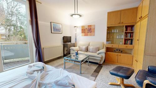 Binz Apartment | strandnahe FeWo mit Schwimmbad im Haus, a cappella 15, Binz