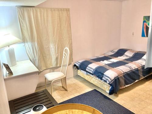 Sunset Apartment | Studio Suite with private Living room at semi-basement
