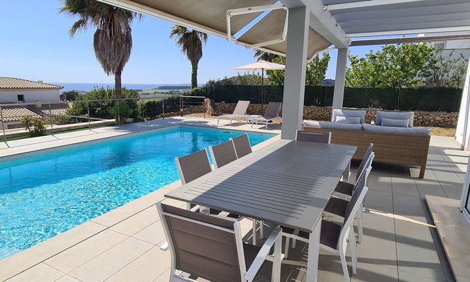 Sant Jaume Mediterrani House | Stunning modern villa with stunning Son Bou beach views, heated pool