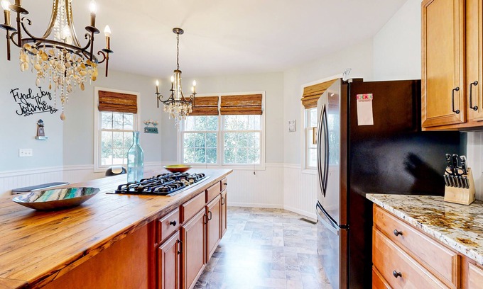 Rehoboth Beach House | Stylish home with heated indoor pool, game room, home theater, gym, yard, & deck