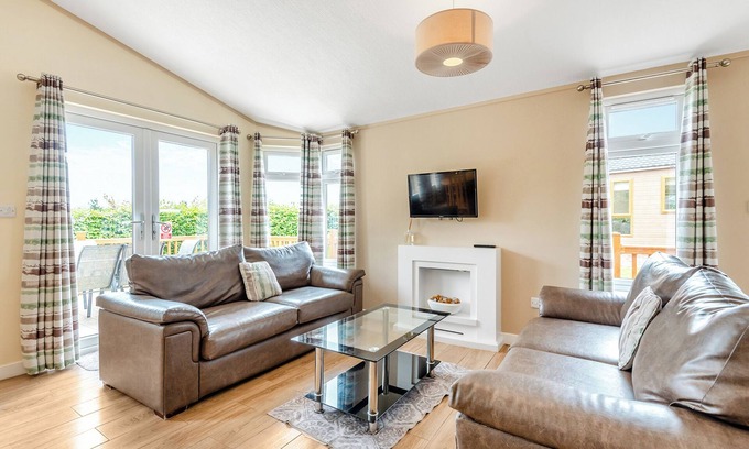 Halfway House Ski Chalet | Stylish luxury lodge with meadow view.