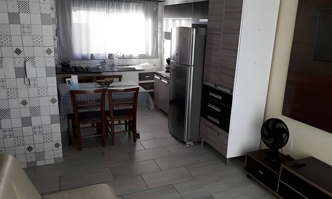 Ressacada Apartment | Suite TEN air conditioning and kitchen