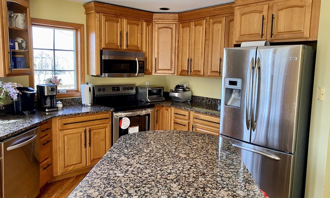 Hyde Park House | Sunny home sitting among the beautiful woods in Hyde Park, NY.