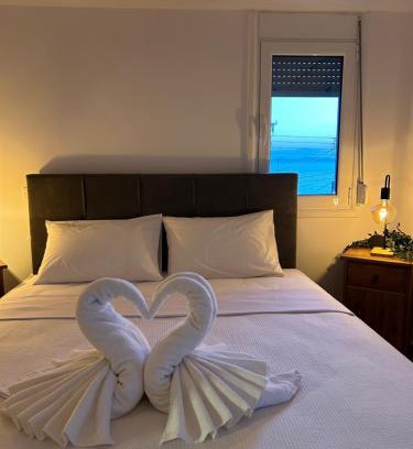 Saronida Apartment | Sunny Modern Beach Retreat Steps from the Shore