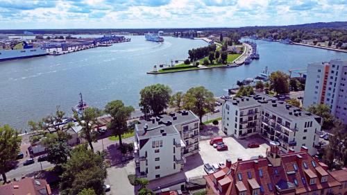 Swinoujscie Apartment | Sunset Apartments - Flotylla - Nowoczesne mieszkanie z widokiem na port, prywatny parking, blisko mariny jachtowej, Park Zdrojowy