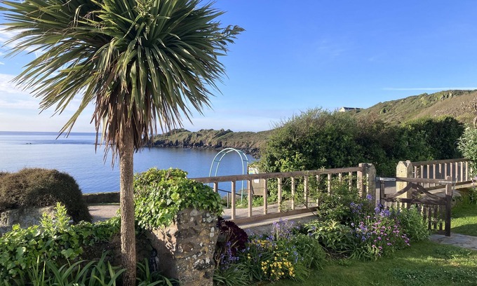 Coverack House | Superb sea views. Private off-road parking. Fenced garden. Spacious,light,airy.