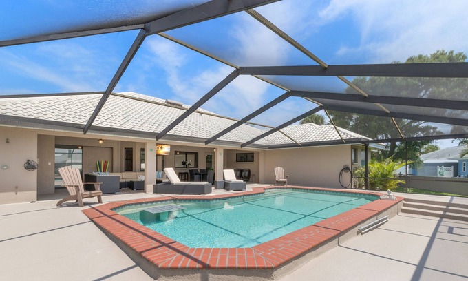 Apollo Beach House | Surfside Beach House | Pet Friendly, Canal. Pool!