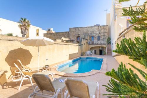 Birbuba House | Ta'Leli Pool Farmhouse in Gozo - Happy Rentals