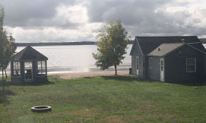 Shell Lake Cabin | The beach is calling.right outside your window. come relax and play!