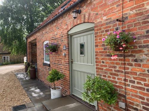 Glentham House | The Bolthole barn with wood-fired hot tub