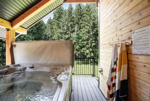 Revelstoke Apartment | The Cedar Suite - Secluded Mountain Retreat with Forest Views and Hot Tub