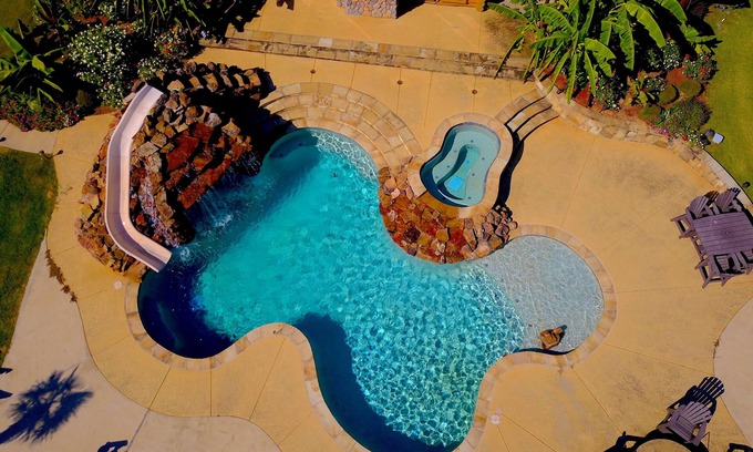 Shreveport Cabin | The Grand Lodge, Pool House, & Private Pool at God's Country Resort