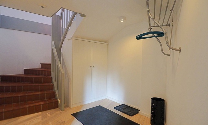 Wyk auf Foehr Apartment | The location is heavenly quiet on the outskirts of the city, surrounded by green trees.