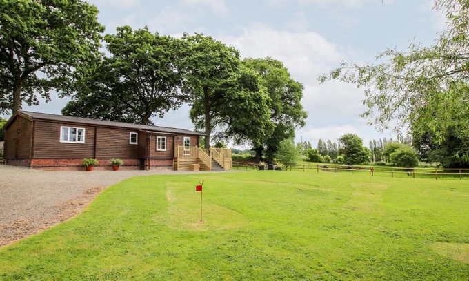 Newnham House | The Log Cabin