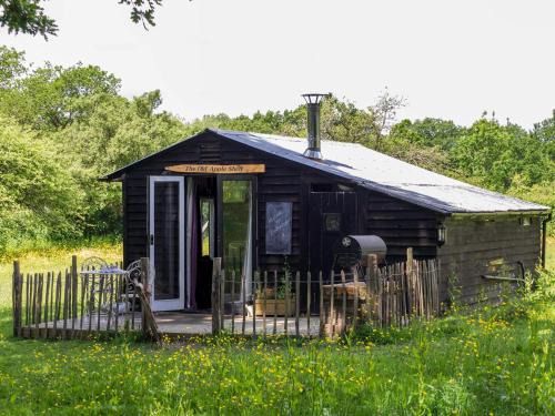 Bethersden Ski Chalet | The Old Apple Shed cosy heated cottage in a meadow close to the charming village of Bethersden