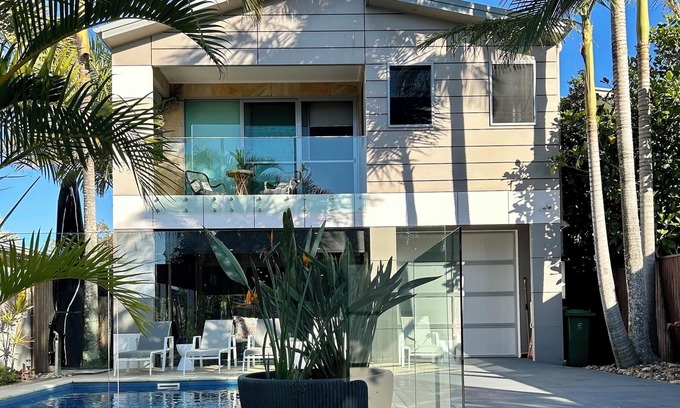 Mudjimba House | The Palm - Beachside Home with Heated Pool, Cinema & Games Room