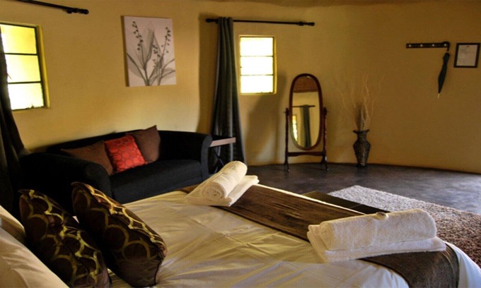 Hlotse House | The Queen-Size-Bed Riverside Huts