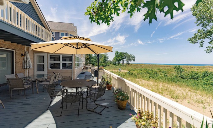 Michigan City Apartment | The View from this Lakeside Cottage with Beach in Backyard, is BEAUTIFUL!