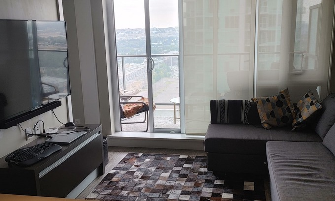 Victoria Park Apartment | Top floor condo that is your ideal stay for Stampede