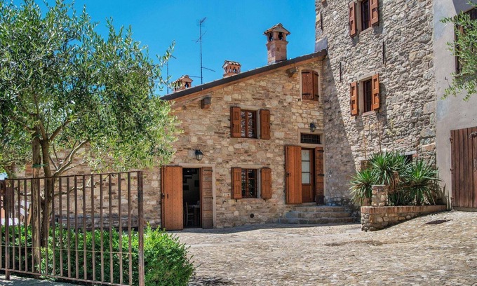 Ca' de' Grimaldi House | Tranquil Village Stay with Fireplace