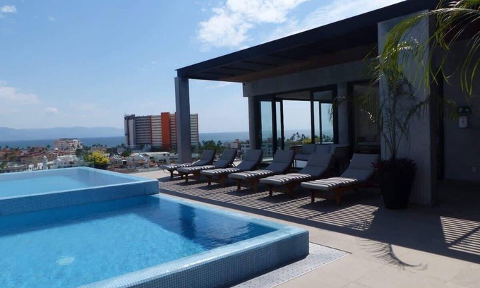 Diaz Ordaz Condo | Tropical Oasis ★ Penthouse ★ Stocked Kitchen