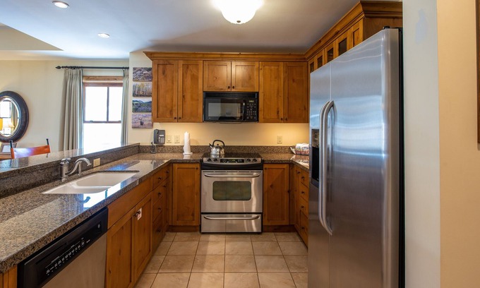 Crested Butte Condo | Two Bedroom Condo with Balcony over Mountaineer Square - Just Steps from the Slopes! 2 Condo - No Cleaning Fee! by RedAwning
