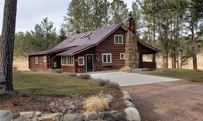Custer House | Two story authentic log construction home, built in 1936 with two fireplaces.