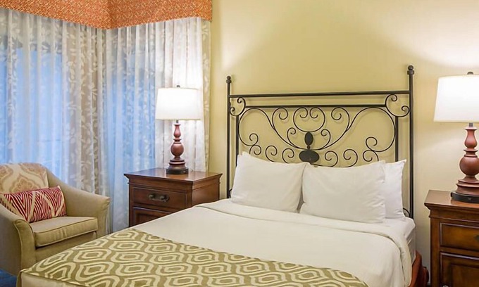 Cibola Vista Resort | UpScale Resort with Outdoor Heated Pool with a waterslide and a poolside bar, tennis court and gym