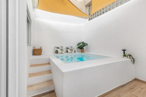 Sant Blai Apartment | Urban Chic Oasis with AC, Private Pool and Wifi