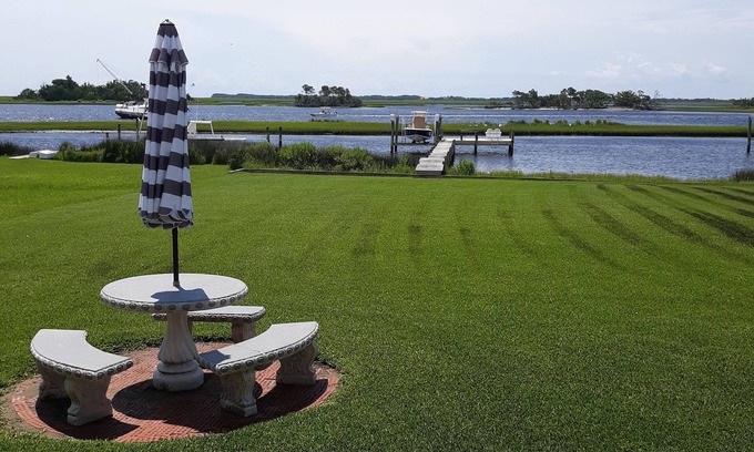 Hubert Apartment | View of intracoastal waterway with private dock and boat lift.