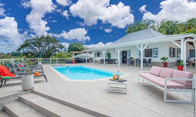 Le Vauclin House | Villa Cacyli: private heated pool and Jacuzzi, view of Baie des Mulets