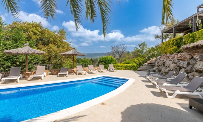 Santa Cristina de Aro Villa | Villa 'Golf' with Mountain View, Wi-Fi and Air Conditioning