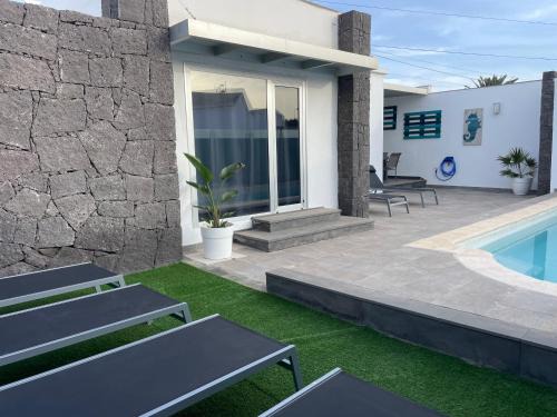 Tahiche Villa | Villa Grey by Vulcano Homes