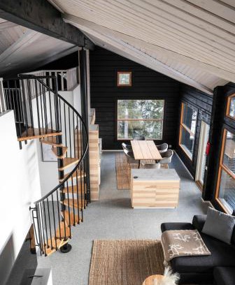 Rukatunturi Apartment | Villa Ruka - Rising Sun with 3 bedrooms, loft, sauna and balcony with a view