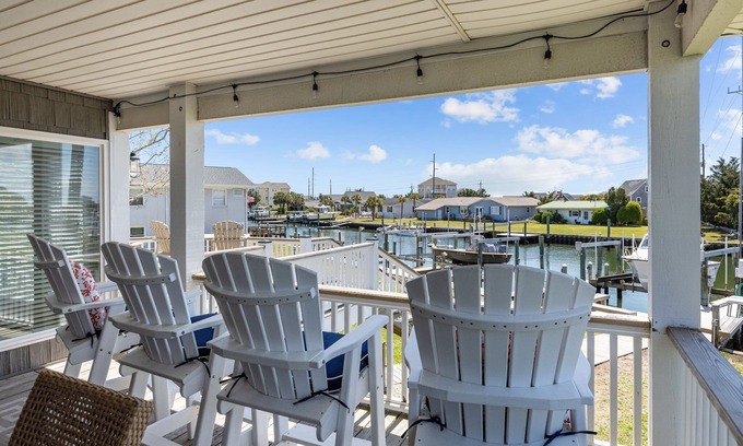 Atlantic Beach House | Water-front home w boat lift! Short walk to the beach!