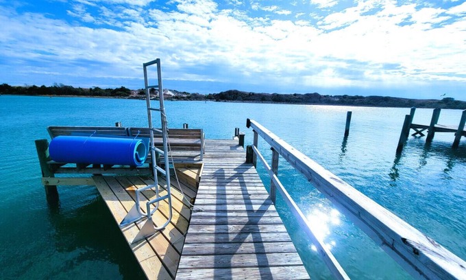 Cedar Point House | Waterfront Home with a private dock, hottub, and 3 miles to the beach