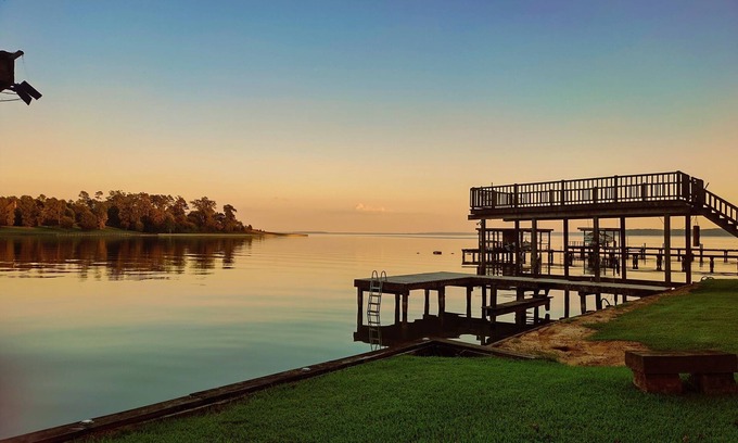 Pointblank House | Waterfront lake house, huge deck, king beds, family friendly on Lake Livingston!