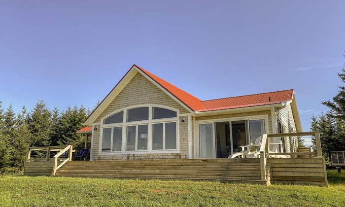 Darnley House | Waterfront oasis with private dock, hot-tub, 2 minutes to beach