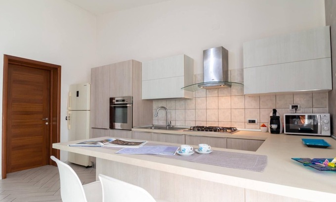 Nurachi Apartment | Welcomely - Mameli Apartment
