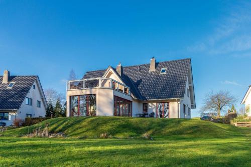 Buschvitz Apartment | Whg-1-Schwalbennest-Ferienhaus-Am-Boddenufer-Buschvitz