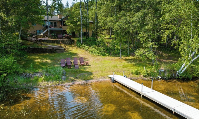 Spooner House | Whispering Woods- Spacious 5 bedroom home with sandy frontage near Spooner, WI.