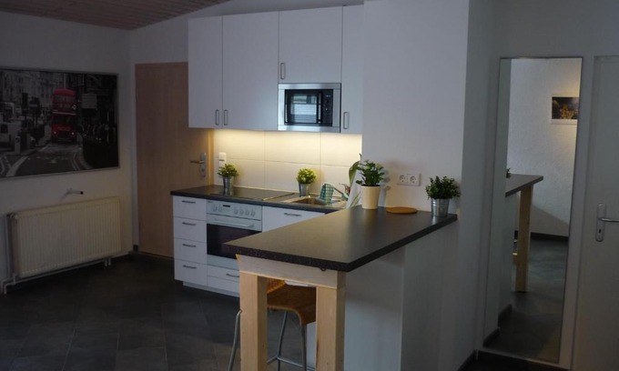 Piesteritz Apartment | Wohnen im ehemaligen Kaminstudio mit Klimaanlage