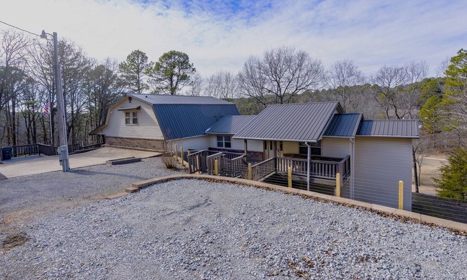 Kansas House | Woodland Escape, A rustic Charm meets Modern comfort in this 2BR 2BA home.
