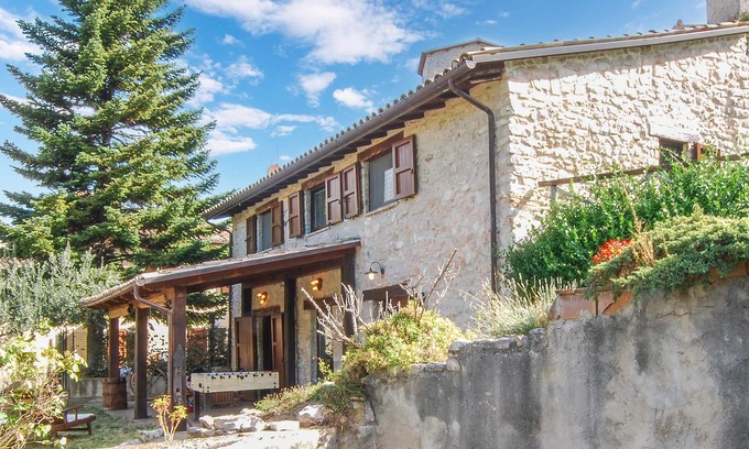 Pievefavera House | You will be greeted by a beautiful stone house with many amenities overlooking Lago di Borgiano.