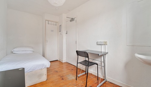 Basic Single Room, Shared Bathroom