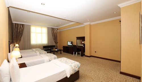 Superior Quadruple Room, City View