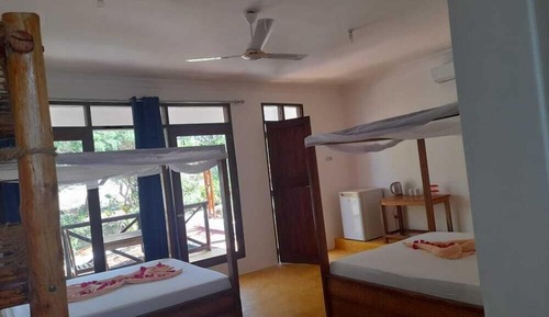 Triple Room with Balcony and Garden View