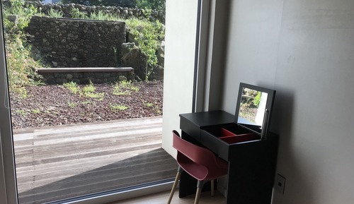 Terraced resort pension with basaltic garden