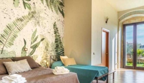 Camera Quadrupla Esclusiva